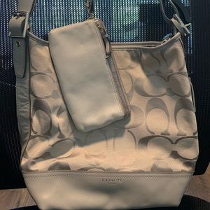 Gray Coach Signature purse and wallet